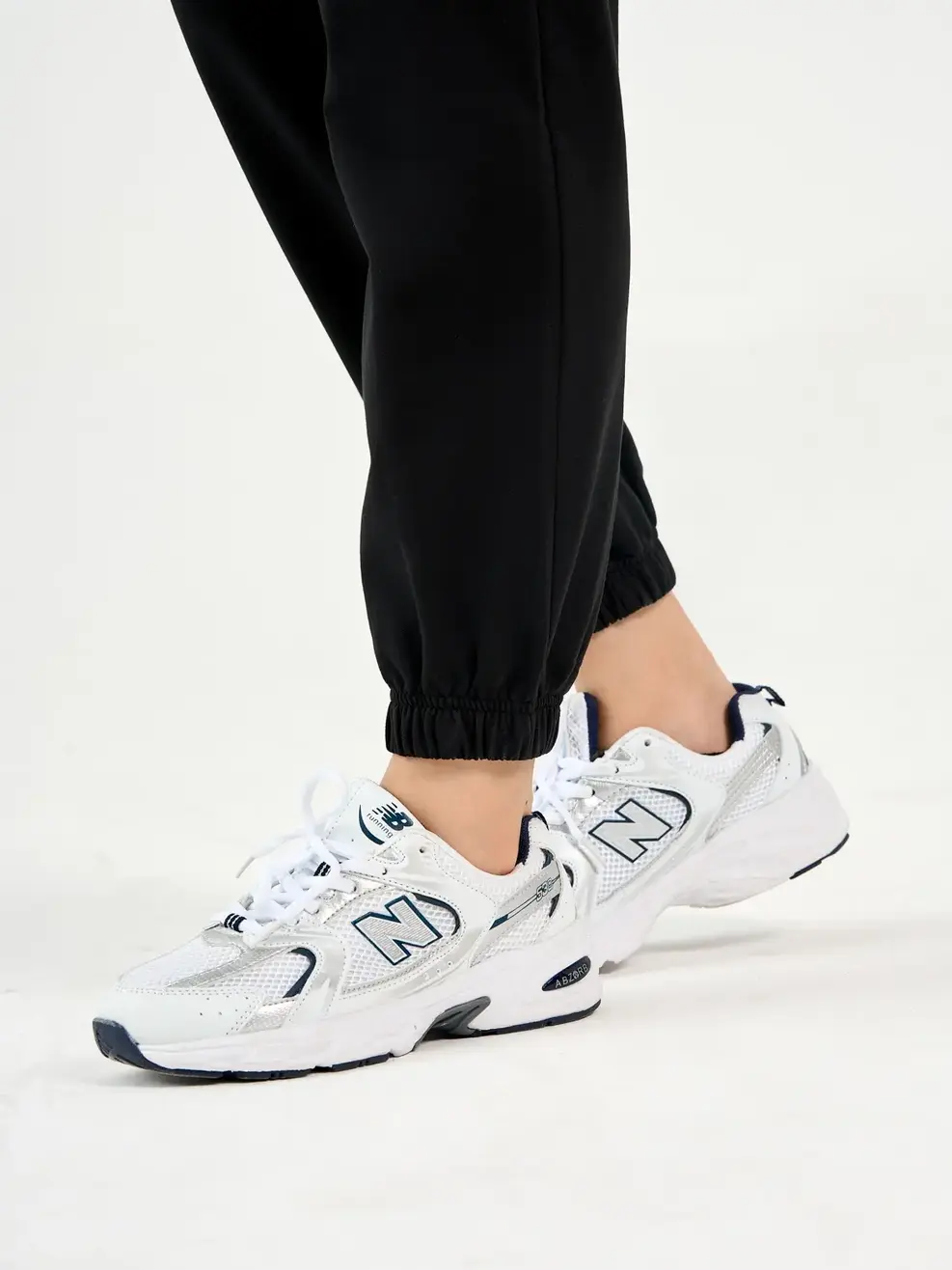 Bộ nữ nỉ in DYNAMIC - Trắng phối đen - S