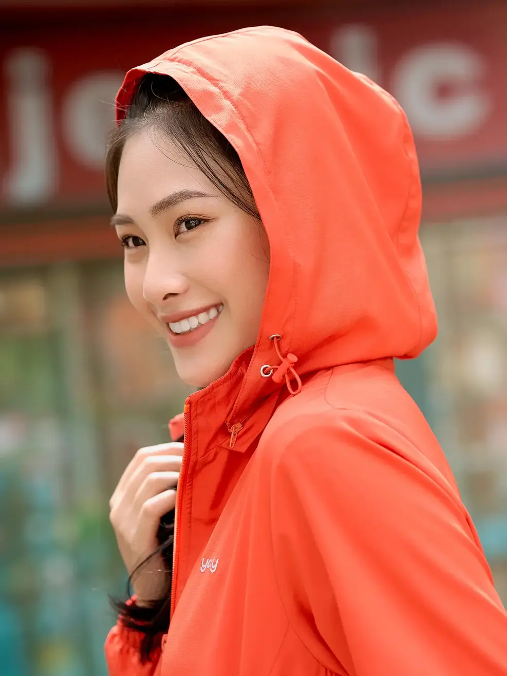 Áo khoác gió nữ trượt nước thông minh - Cam 1 - L