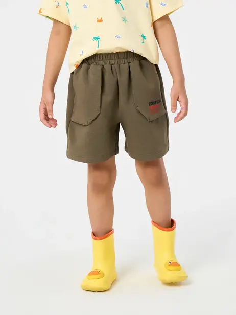 Quần Shorts bé trai túi ốp kidult club