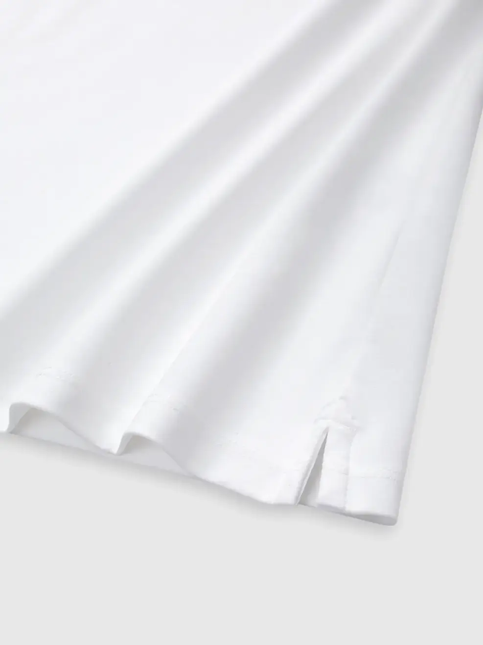 Áo Polo Nữ Slim In Thân Trước Có Xẻ Tà - Trắng 001 - S