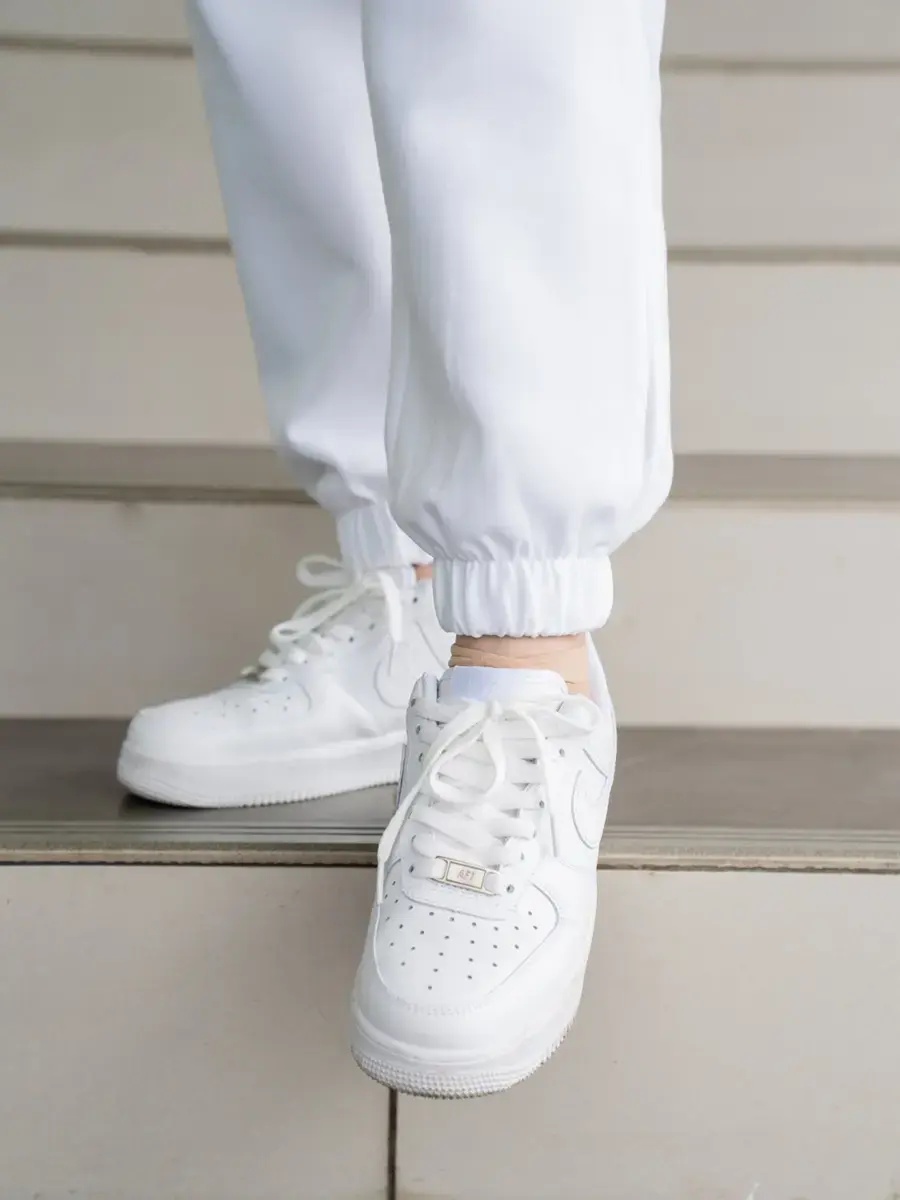 BỘ ĐÔNG NỮ CHẤT NỈ UNIVERSAL SPORT - Trắng - S