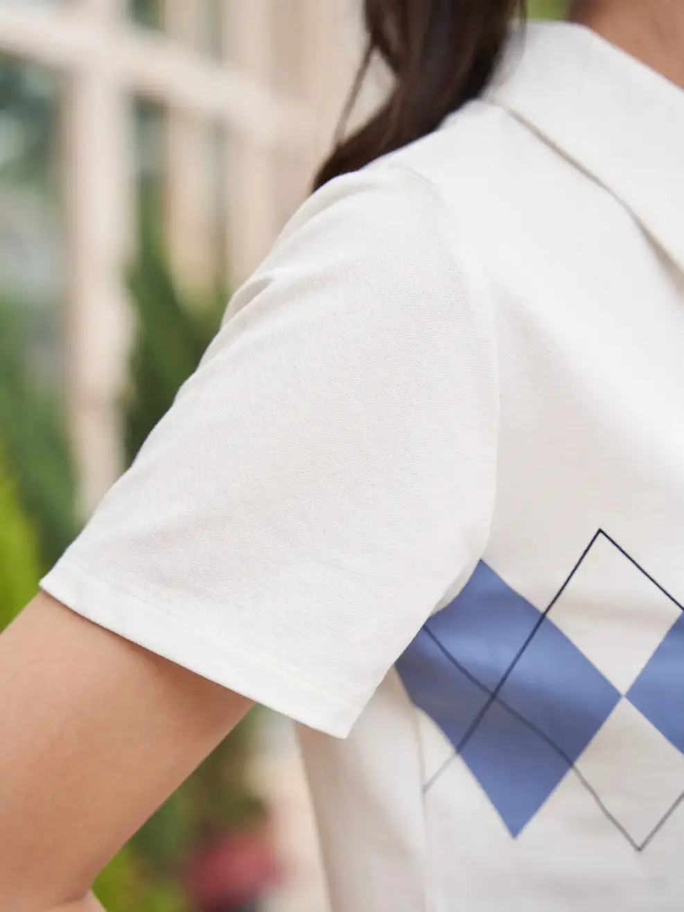 Polo nữ mắt chim croptop in hình - Trắng - S