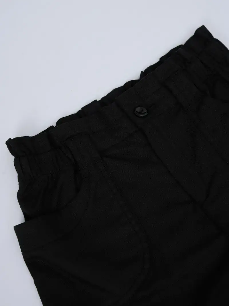 Quần Shorts Bé Gái Túi Ốp - Đen 001 - 2-3