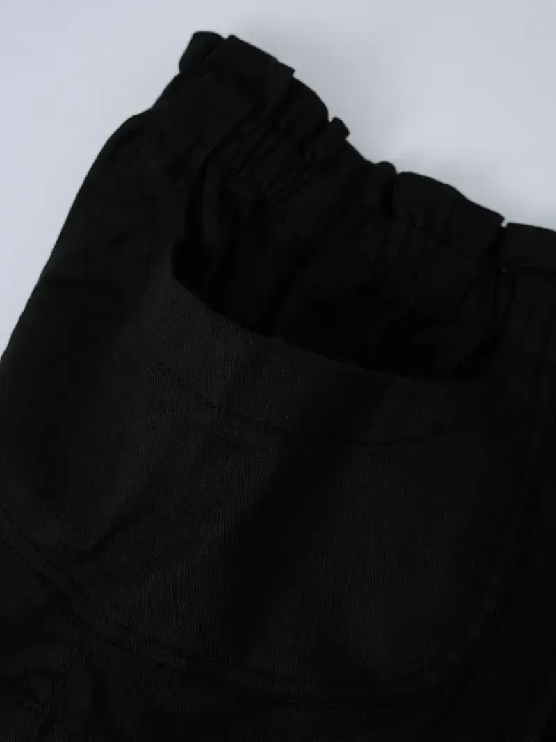 Quần Shorts Bé Gái Túi Ốp - Đen 001 - 2-3