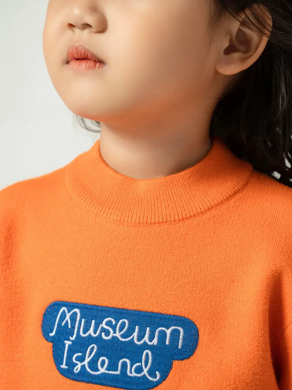 Áo len kid thân sau thêu lâu đài - Cam - 2