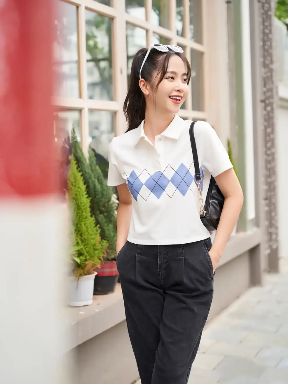 Polo nữ mắt chim croptop in hình - Trắng - S