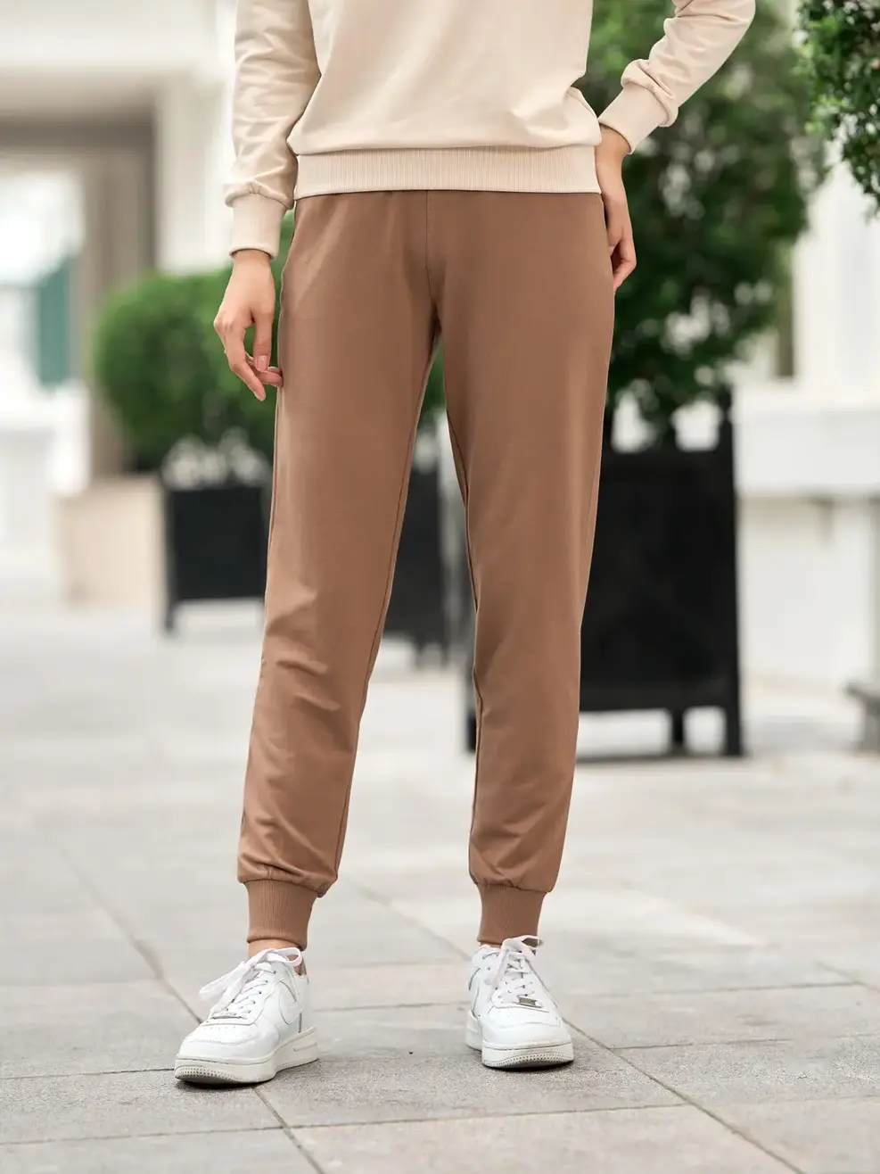 Bộ đông nữ in logo - Be phối nâu - S