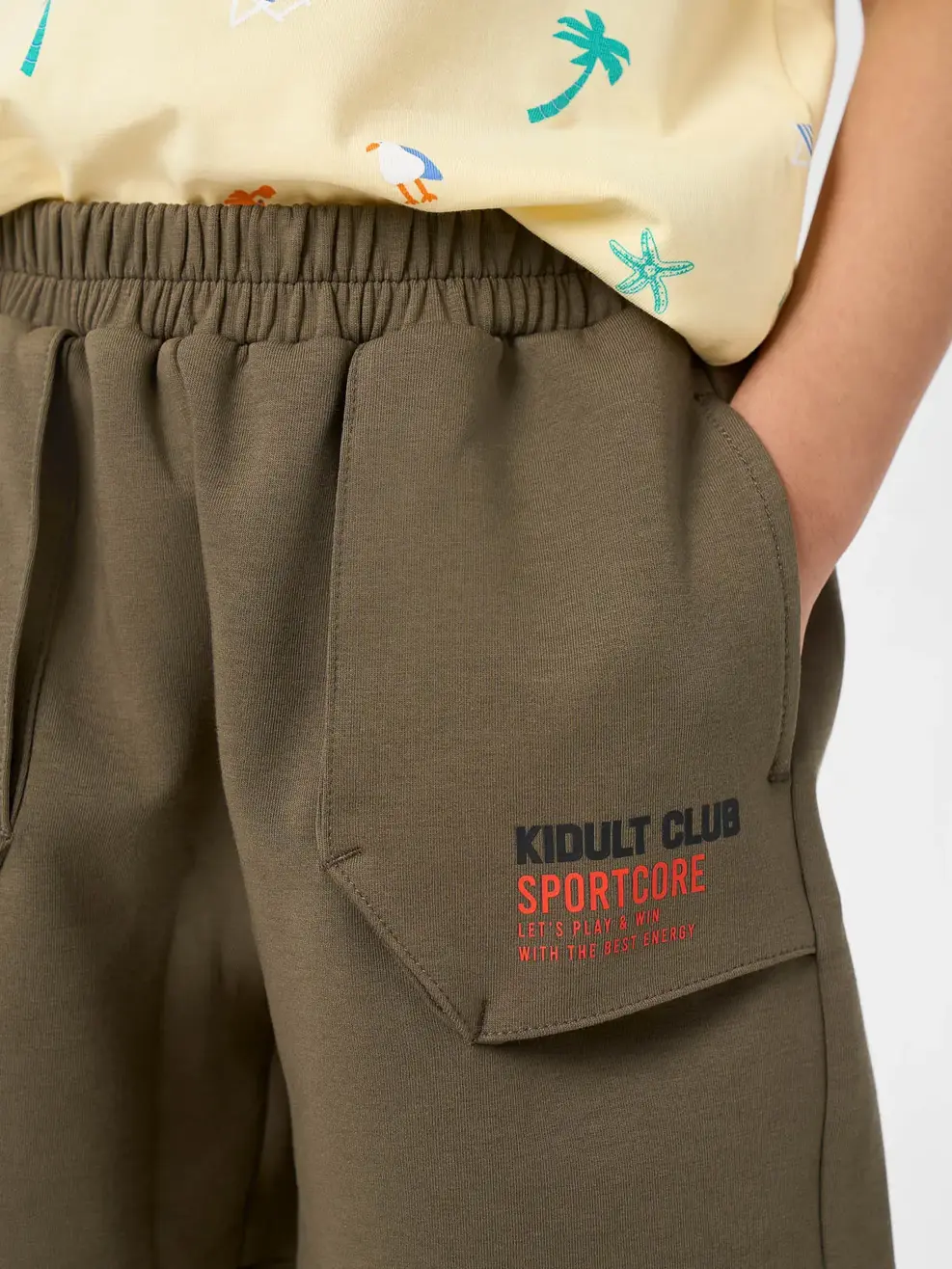 Quần Shorts bé trai túi ốp kidult club - RÊU 035 - 110