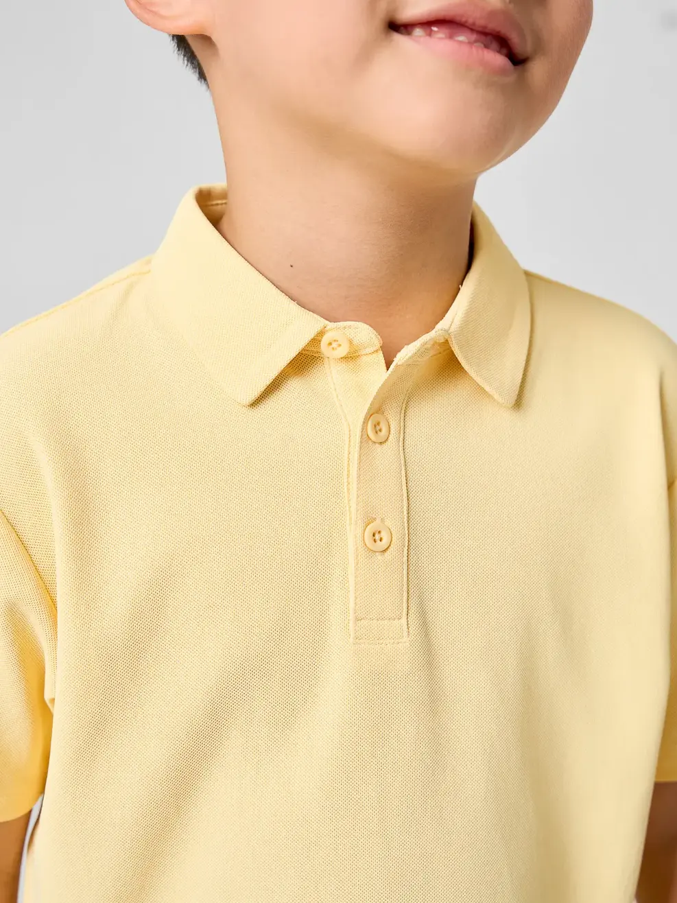 Áo Polo Kids Regular Cổ Ép Có Xẻ Tà -  Vàng 064 - 104
