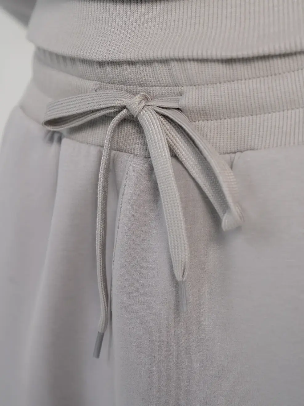 BỘ ĐÔNG NAM CHẤT NỈ UNIVERSAL SPORT - Ghi - M